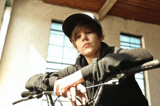 Justin Bieber on a bike
